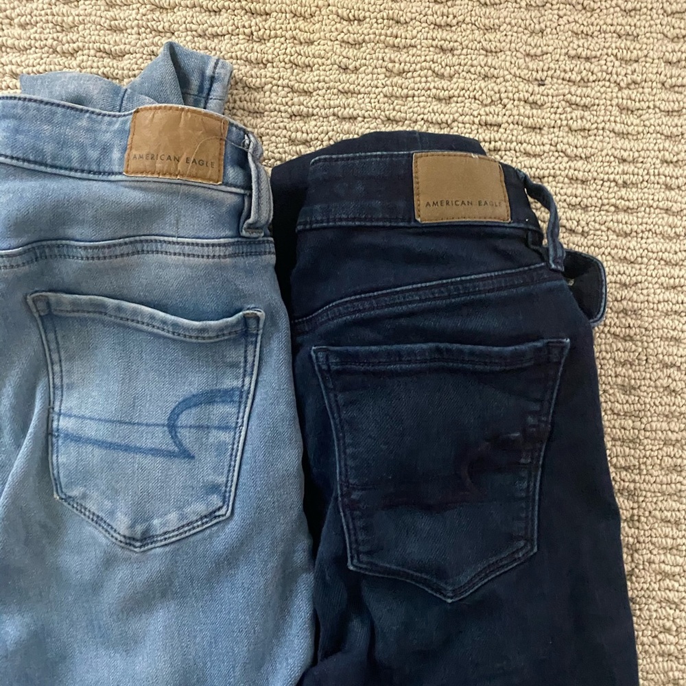 TWO AMERICAN EAGLE JEANS